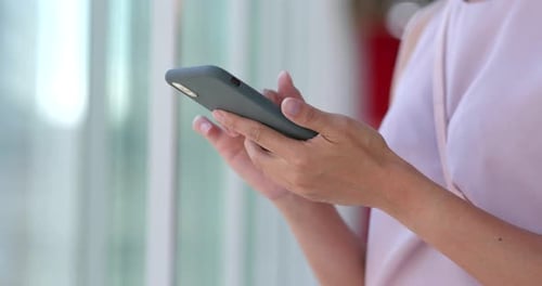 Close up Woman use of mobile phone