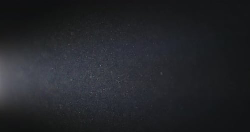 Cinematic Floating Dust Particles with Atmospheric Light Overlay