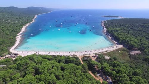 Aerial view of boats in a beautiful azure lagoon