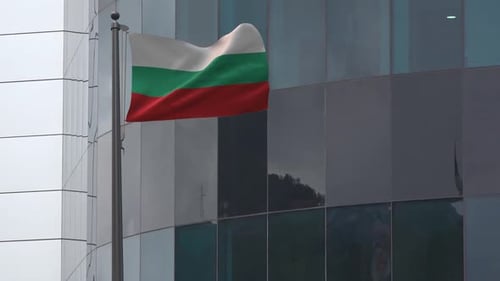 Waving Bulgarian Flag on Modern Corporate Building