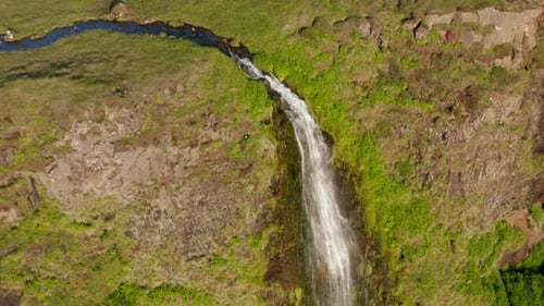 Aerial View Orbit Around Seljalandsfoss Waterfall in Iceland