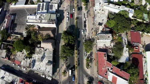 Aerial View of the Street Intersection with Cars Driving Down the Streets