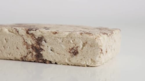 Slow tilt on halva made of sesame 4K video