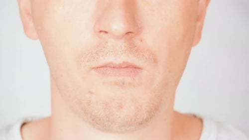 Adult Eating French Fry Close Up