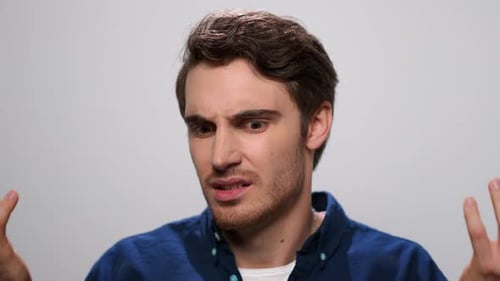 Displeased Guy Gesturing with Hands, Annoyed Man Posing in Studio