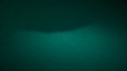 Hand Puts Royal Flush of Spades on Table