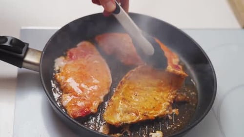 Frying Meat in Pan for Home Cooking