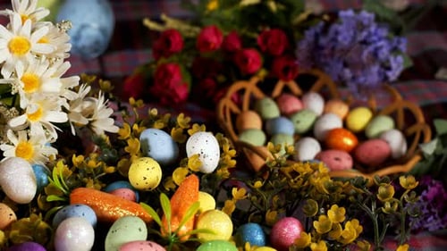 Colorful Easter Eggs and Flowers on Table