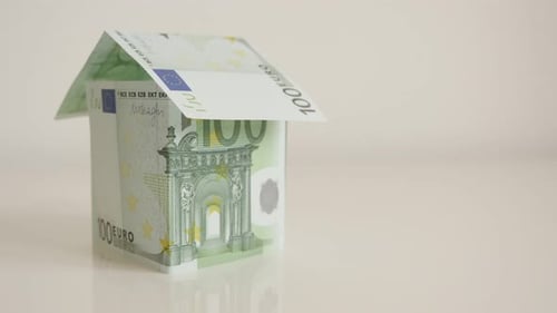 Hundread Euro banknotes house concept close-up 4K 2160p 30fps UHD tilting footage - Real estate met