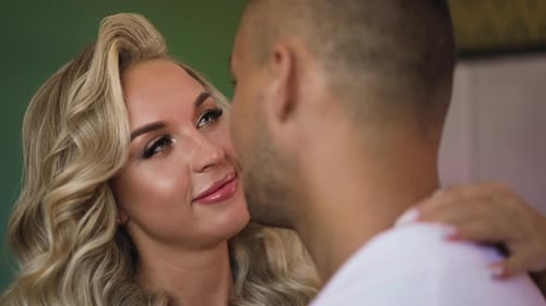 Woman Looking Affectionately at Man in Close Up