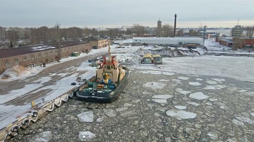 Tug ship in ice port
