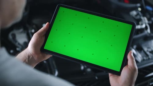Tablet Green Screen Display in Auto Repair Shop