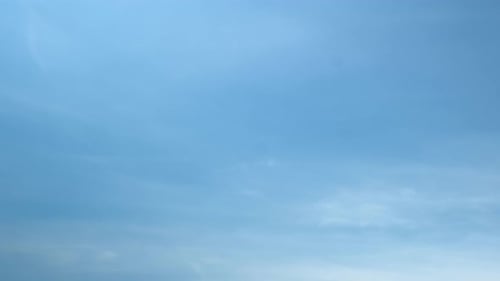 Clouds Drifting Serenely Across Blue Sky Time Lapse
