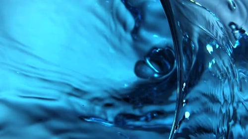 Blue Water Being Poured Abstract Close Up