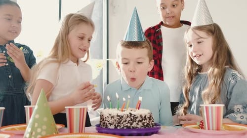 Children Celebrate Birthday With Cake and Party Hats