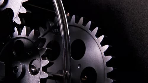 Gears Turning in Industrial Machine Close Up