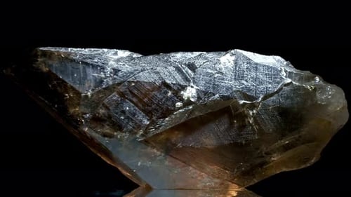 Smoky Quartz Mineral Rock Gem Stone Quartz Geology Specimen, Quartz Rotates on a Black Background