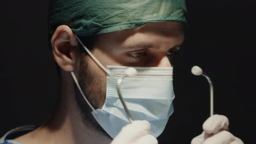 Doctor wears stethoscope