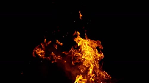 Intense Fiery Flames Burning Against Black Background