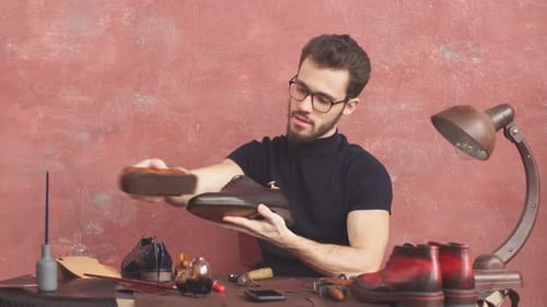 Adult Man Buffing Brown Leather Dress Shoes