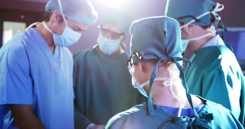 Surgical Team Working in Hospital Operating Room
