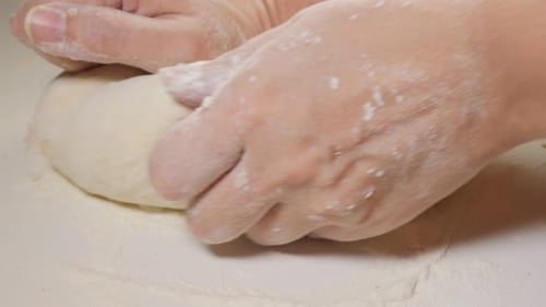 Dough manually bake job close-up 4K 2160p UHD footage - Bakery work with dough 4K 3840X2160 UHD vid