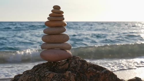 Concept of Balance and Harmony - Stone Stacks on the Beach