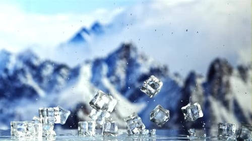 Ice Cubes Fall on the Table and Rotate in the Air