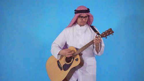 Arab Man with an Acoustic Guitar
