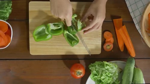 Chopping a Green Pepper for Salad