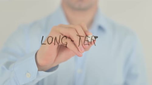 Hand Writes Long-Term on Clear Surface with Marker