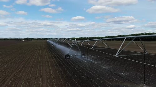 Watering Systems on the Fields with Dry Ground, Amazing Landscape,