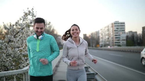 Beautiful Couple Jogging and Fitness Training Outdoor
