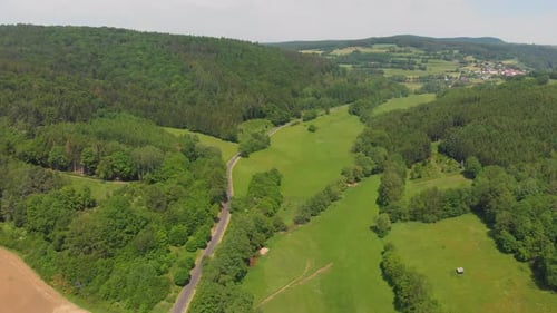 small road passing through beautiful countryside