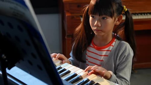 Girl Plays Piano at Home, Musical Education