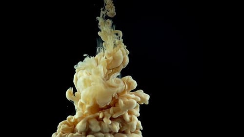 Tan Ink Swirling in Dark Water