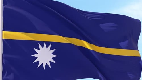 Vibrant Nauru Flag Waving Seamlessly Against a Blue Sky