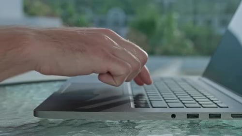 Hands Typing on Laptop Computer and Closing