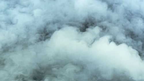 Abstract Shot of Swirling Plumes of Vaporous Clouds