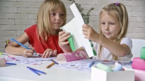 Two Girls Enjoying Arts and Crafts Together