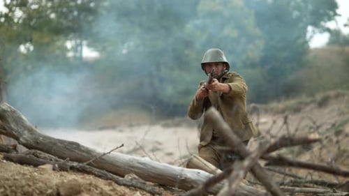 Soldier Aims Rifle in Military Reenactment