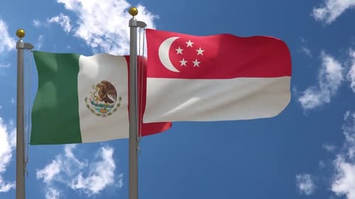 Mexico and Singapore Flags Waving Together on Flagpoles