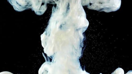 White Liquid Flowing on Black Background