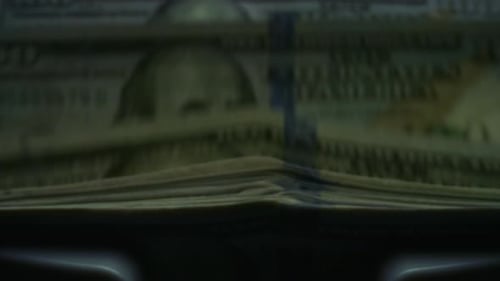 Money Counter Machine Processing Hundred Dollar Bills