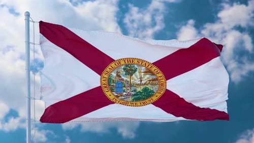 Florida State Flag Waving Against Blue Sky