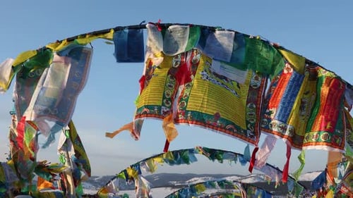Prayer Flags Waving on a Sunny Winter Day