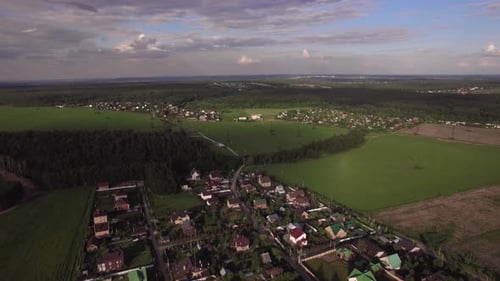 Flying Over Vast Green Rural Areas and Villages, Russia