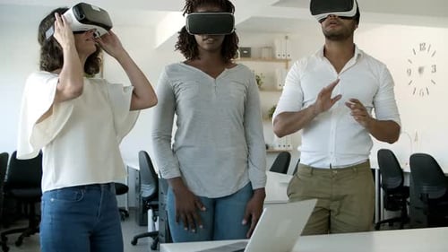 Slow Motion of Three Testers with VR Headsets