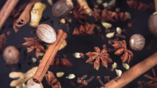 Assortment of Spices Falling Away