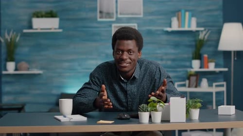 Man talking at a desk